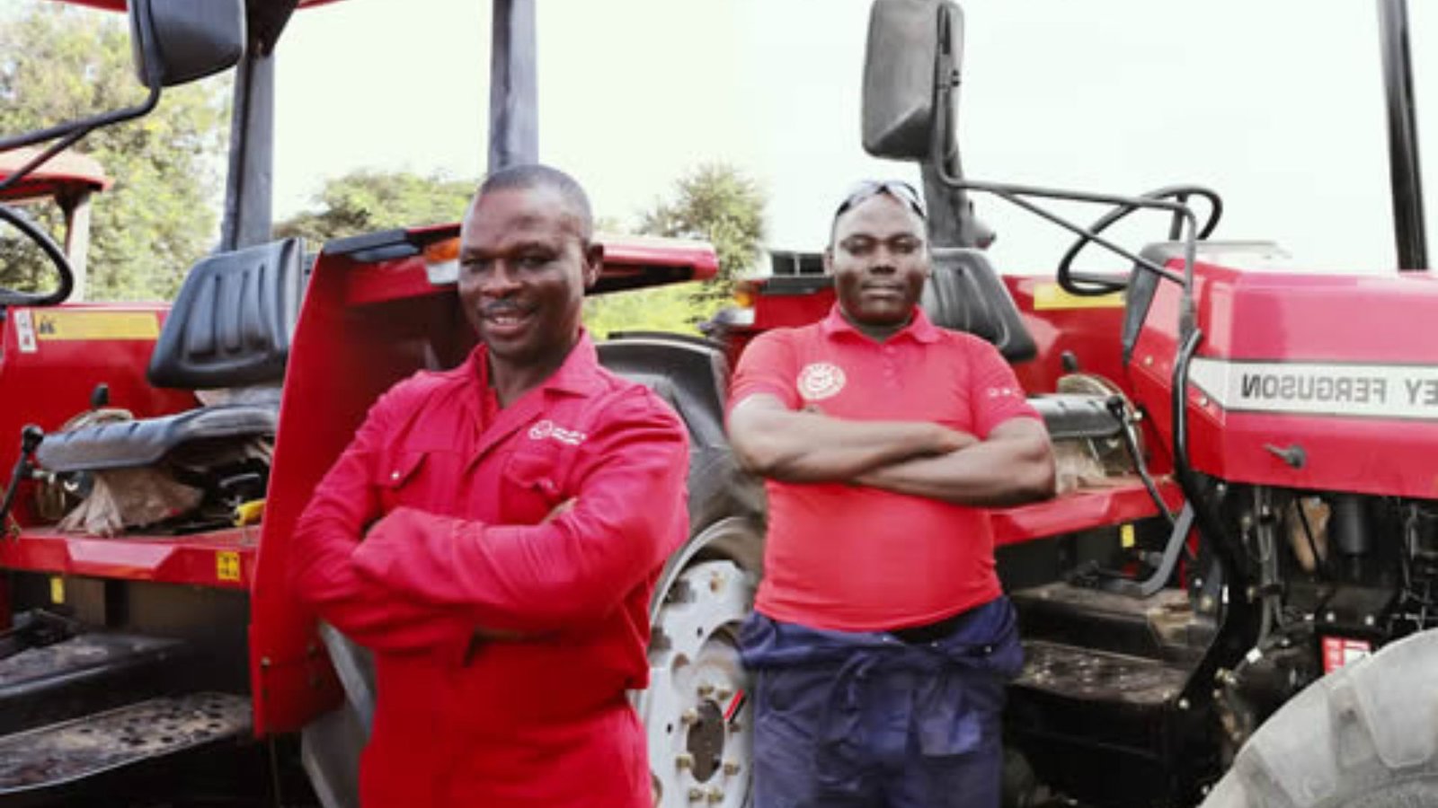 two aric dealers standing in front of a truck